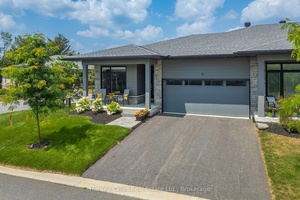 Located in the heart of Huntsville, this stunning end unit bungalow townhouse is situated in a vibrant and emerging community, just minutes from the downtown area.