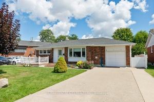 Charming red brick bungalow with attached garage and concrete double way driveway, located close to hospital.