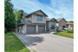 Discover refined living in this exceptional Rochon Construction, 5 bedroom, 3 bathroom residence, ideally situated in one of the region's most coveted communities.