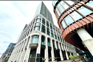 Welcome to this stunning modern 1 bedroom plus den condo at The Well by Tridel, offering breathtaking skyline views.