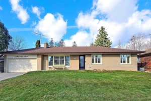 Welcome to this stunning, fully renovated 3 bedroom ground level home, perfectly situated on a massive lot in one of the area's most sought after neighborhoods.