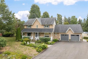 Top 5 Reasons You Will Love This Home 1 Stunning two storey family home on a quiet Midhurst street, set on a large 0.