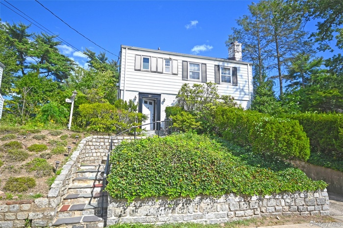 View of front of home with a chimney