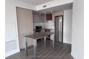 Welcome to this stunning in a luxury condo under 3 years old, featuring 2 spacious bedrooms, 2 full bathrooms and a balcony with clear views of Hwy 427.