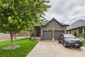 This solid brick Walker Home, built in 2018, offers 1, 417 sq.