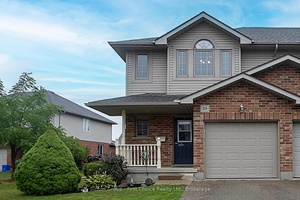 Charming end unit townhouse with huge pie shaped yard !