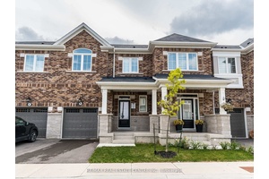 This 2 storey townhouse features a bright and spacious open concept main floor that boasts smooth 9 ft.