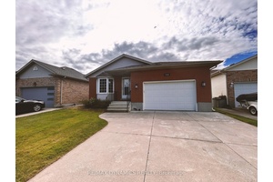 Welcome to this beautiful detached bungalow located in the desirable Mount Carmel neighborhood of Niagara Falls.