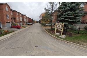 Carefully Maintained, Largest Model In The Complex, Over 1430 Sqft Plus An Unspoiled Walk Out Lower Level To A Large Backyard.