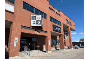 Turnkey office suite with private kitchenette, natural light and 2 dedicated parking spots.