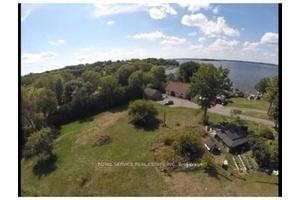Charming 1935 Home Lake Views and Rich History, this delightful home, originally built in 1935 in Gores Landing, was impressively relocated across frozen Rice Lake by a team of horses ...