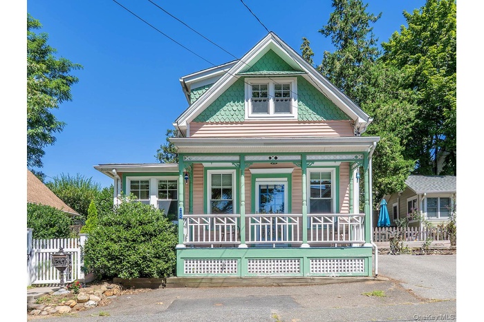Victorian-style house with covered porch