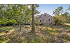 Timeless Springs Cottage Set on a quiet half acre corner lot, this classic home blends character with opportunity.