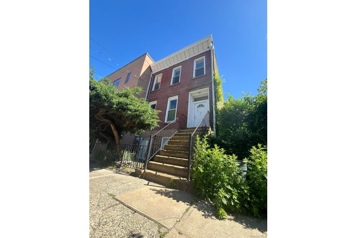 Multi unit property featuring brick siding