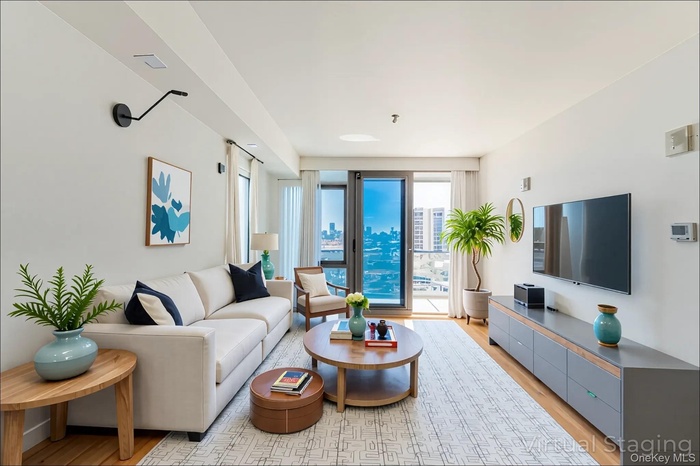 Living room featuring light wood-style floors