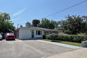Investor Attention ! Stunning Semi Detached 3 2 Bedroom, 3 full bathroom Bungalow with Oversized lot and Professionally Renovated from top to bottom !