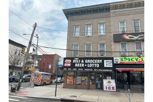 Great investment brick corner Mixed use commercial property, 2apartments and 2 stores, walking distance to buses, train, shops, restaurants,