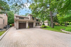 Nestled in the prestigious Gordon Woods neighborhood, this fabulous detached home sits on a serene, tree lined cul de sac.