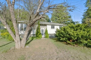 Situated in a mature and highly sought after central neighborhood, this raised bungalow presents a rare opportunity to own a versatile home within walking distance to downtown.