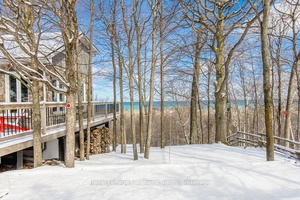Stunning Alpine Views Rare Oversized Lot One Owner Family Home Welcome to this beautifully maintained, family built chalet set on a rare 100 x 213 ft lot with sweeping views ...