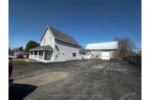 An incredible opportunity to run your business or a multiple rental opportunity with a 2400 sq ft building that can be used for offices, board rooms, separate rentals or as ...