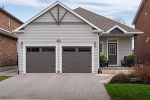 Situated on a picturesque street in the sought after Mountaincroft community, this exceptional 2500 sq ft total bungalow offers turn key living at its finest.