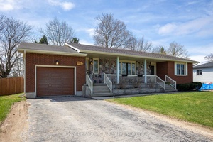 All brick bungalow with covered front porch in a family friendly neighbourhood in Allenford.