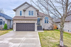 Welcome to this beautiful custom designed 4 level backsplit raised bungalow, offering a perfect blend of modern updates and 1800 square feet of functional living spaces above grade.