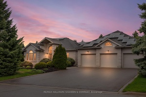 Welcome to this beautifully upgraded and sun filled modern bungalow, nestled in the highly sought after Sharon Hills community.