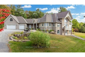 Nestled high upon 5. 7 acres on the protected Carp Ridge, offering spectacular panoramic views of the Carp River Valley, KIN Vineyards and magical sunsets, you will find this Quality ...