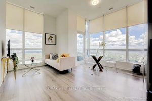 Experience luxury living in this stunning 2 bedroom penthouse suite located on the 55th floor, offering soaring 11' ceilings and unparalleled panoramic views.