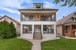 Introducing a truly remarkable legal duplex nestled in the desirable area of Walkerville, this property exudes timeless historic charm while seamlessly blending with modern elegance.
