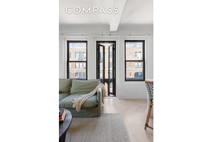 Gracious Greenwich Village One Bedroom with Fireplace and Juliette Balcony Welcome to Residence 11G at 26 East 10th Street a beautifully proportioned one bedroom, one bathroom home in one of ...