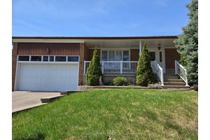 Well Maintained and Inviting Solid Bungalow in A Quiet Neighborhood, With a Park Just Across the Road.