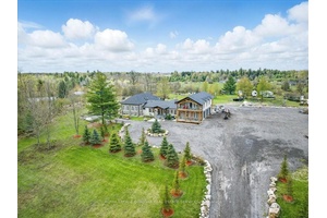 Nestled on a vast 10 acre lot and bordered by serene conservation lands, this exceptional estate presents an unparalleled opportunity for multi generational living or significant rental income potential.