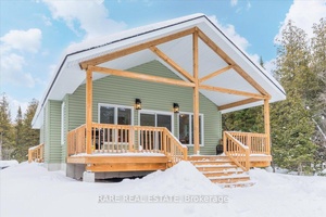 Nestled on two acres just minutes from the pristine shores of Lake Huron on the breathtaking Bruce Peninsula, this newly built home 2022 offers a private, tranquil retreat.