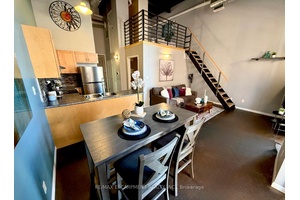 Welcome to Unit 406 at The Annex, an Impressive 2 Bedroom, 1 Bathroom Industrial Loft and Considered One of Hamilton's Most Desirable Boutique Condo Buildings.