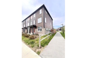 This double garage 3 story home offers 3 bedrooms plus a den, situated on a corner lot with no neighbours on one side.