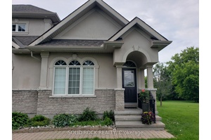 Discover elegant, maintenance free living in this beautifully finished ground level suite, perfectly located on a quiet cul de sac in prestigious Manotick Estates.
