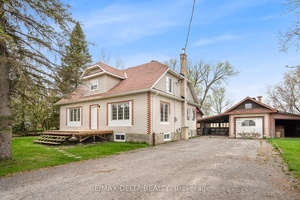 This rare all brick five bedroom home is a unique find on 1.