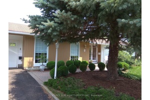 This well maintained 3 1 bedroom with 2 full bathrooms bungalow is located in a quiet neighborhood.