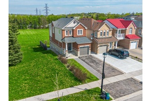 Enjoy the expansive, open backyard with lush green lawn and stunning unobstructed views, the perfect setting for outdoor living, entertaining, or simply soaking in natures beauty.