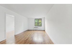 Welcome to an exceptional living experience at 599 East 7th Street, Unit 2B !