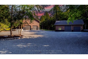 CUSTOM BUNGALOW ON OVER 16.