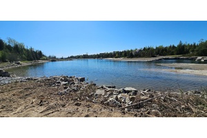 Here is an opportunity to own this vacant waterfront building lot located in an area of prestigious homes and cottages in Stokes Bay on Walter Charman Drive.