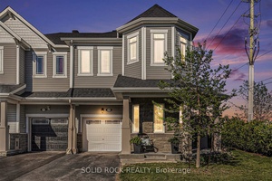 Spacious End Unit Townhome in Desirable Emerald Meadows !