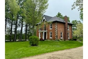 Park like setting on a quiet country road with a large renovated amp ; updated 5 bedroom Century home.