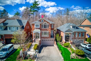 Discover this sun filled, luxurious 4 bedroom, 4 washroom executive home nestled in one of Oakville's top ranked school districts, backing directly onto a serene ravine for ultimate privacy and ...