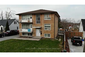 EXCEPTIONAL PURPOSE BUILT TRIPLEX WITH ON SITE LAUNDRY IN A HIGHLY SOUGHT AFTER AREA !