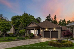 Nestled in one of the most sought after, prestigious enclaves along the Credit River, this stunning custom built detached bungalow offers the perfect blend of luxury, privacy, and natural beauty.
